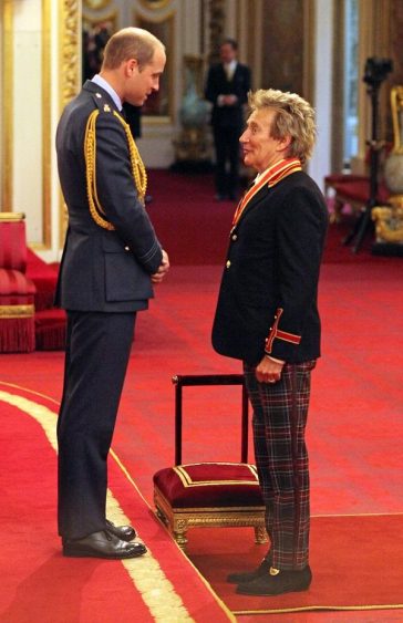 Rod Stewart receives knighthood at Buckingham Palace