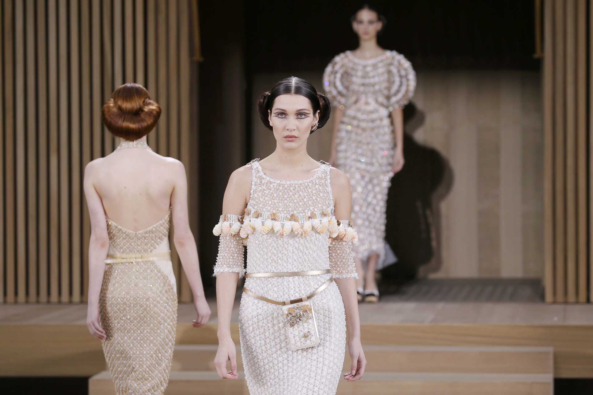 Model Bella Hadid presents a creation by German designer Karl Lagerfeld as part of his Haute Couture Spring/Summer 2016 collection for fashion house Chanel at the Grand Palais in Paris