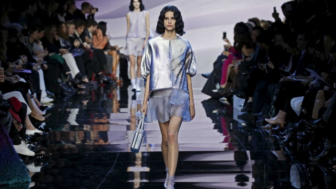 A model presents a creation by Italian designer Giorgio Armani as part of his Haute Couture Spring/Summer 2016 fashion show for Giorgio Armani Prive in Paris