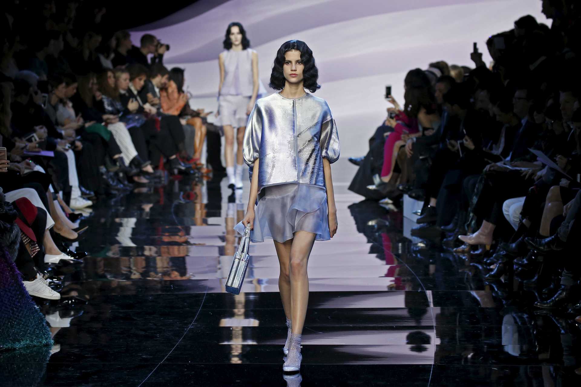 A model presents a creation by Italian designer Giorgio Armani as part of his Haute Couture Spring/Summer 2016 fashion show for Giorgio Armani Prive in Paris