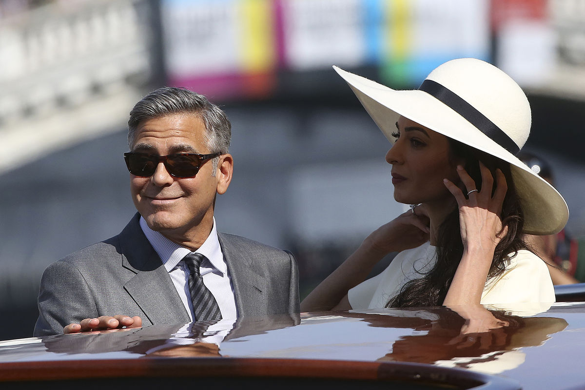 George Clooney escolheu Veneza para celebrar o seu casamento com a advogada, de origem libanesa, Amal Alamuddin, em setembro de 2014 (REUTERS/Alessandro Bianchi)