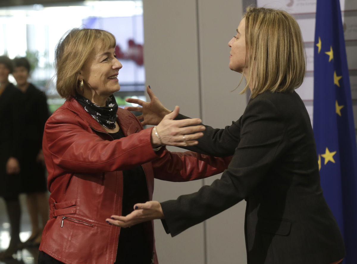 European Union Foreign Policy Chief Mogherini greets Croatia's Minister of Foreign Affairs Pusic during the informal European Union Ministers of Foreign Affairs meeting in Riga
