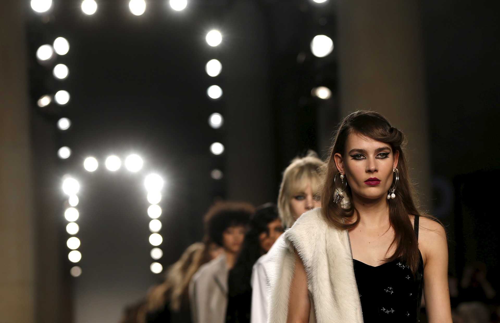 Models present creations at the Topshop Unique catwalk show at London Fashion Week Autumn/Winter 2016 in London, Britain
