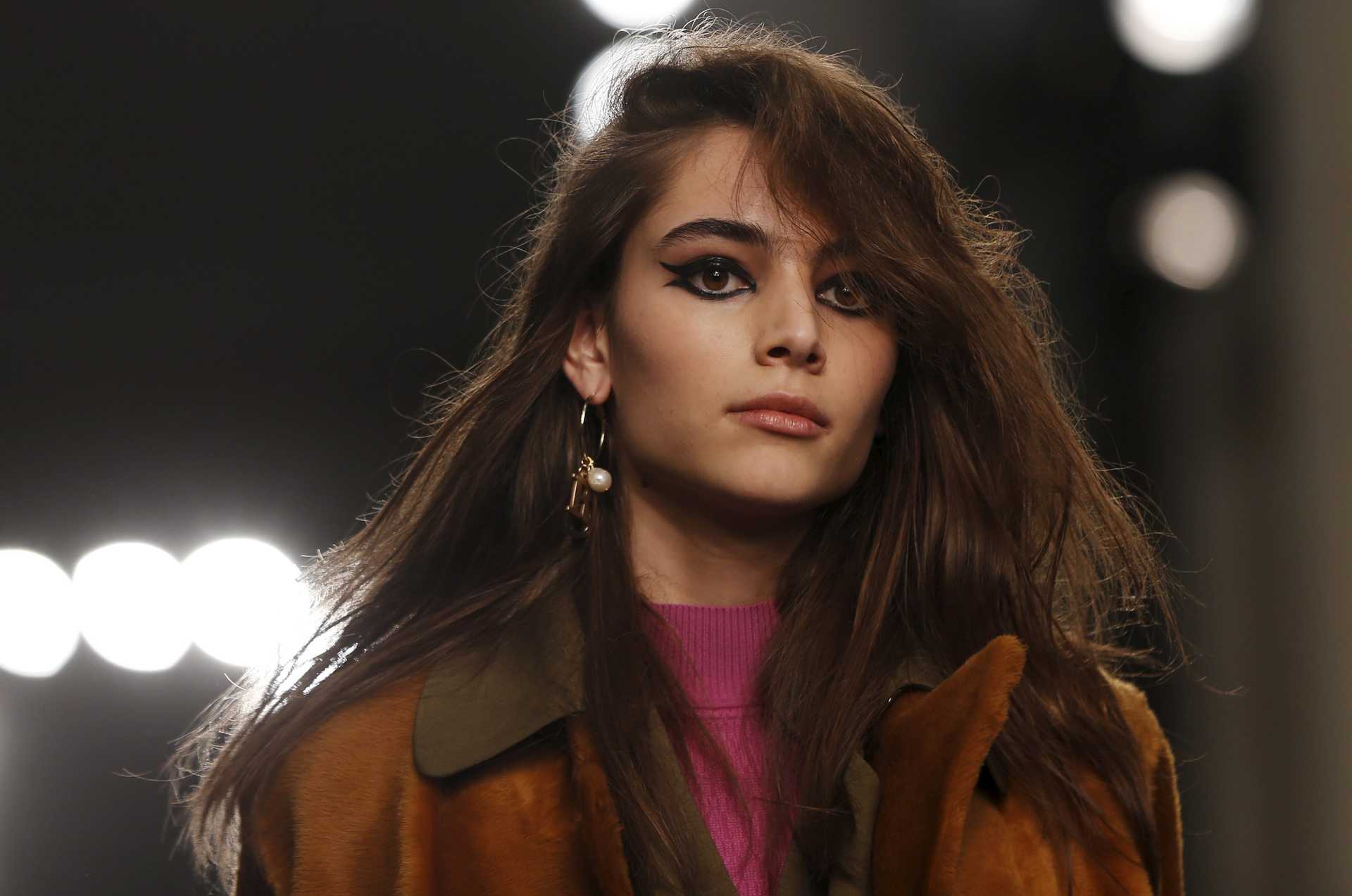 A model presents a creation at the Topshop Unique catwalk show at London Fashion Week Autumn/Winter 2016 in London, Britain