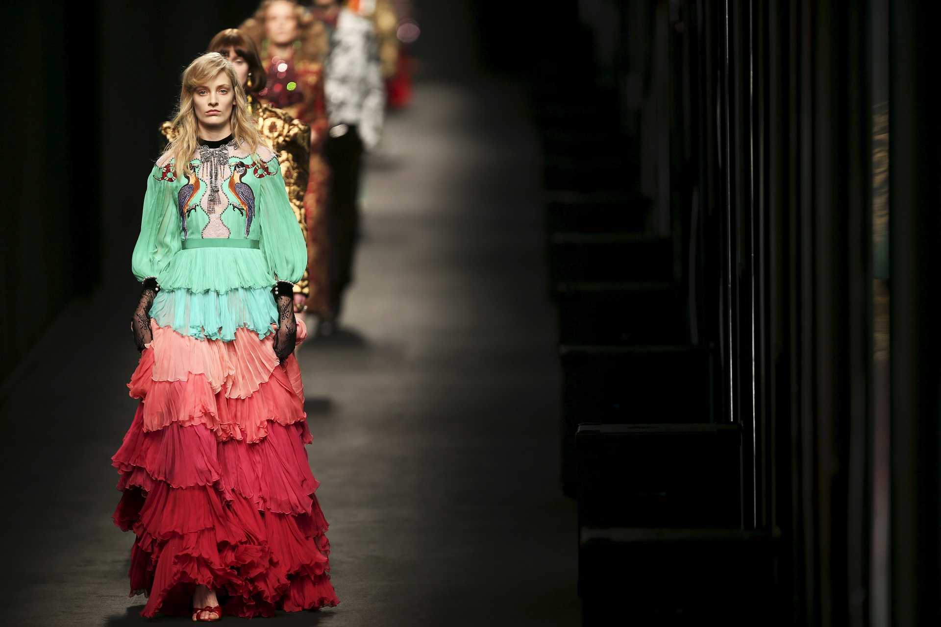 Models present creations from the Gucci Autumn/Winter 2016 woman collection during Milan Fashion Week