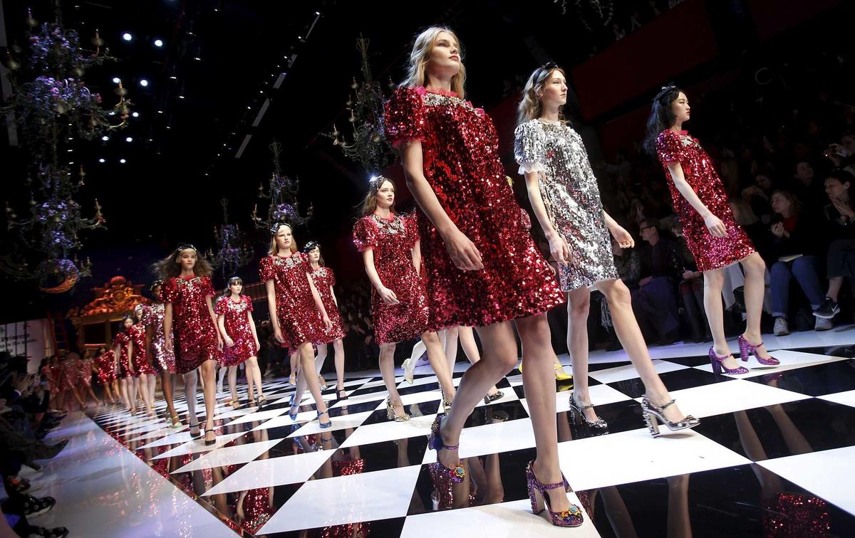 Models parade at the end of the Dolce & Gabbana Autumn/Winter 2016 woman collection during Milan Fashion Week