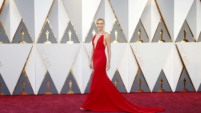 Presenter Charlize Theron arrives at the 88th Academy Awards in Hollywood