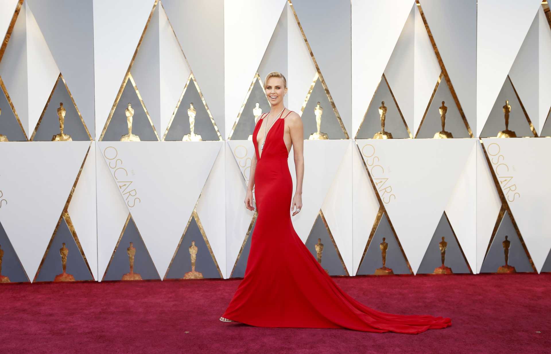 Presenter Charlize Theron arrives at the 88th Academy Awards in Hollywood