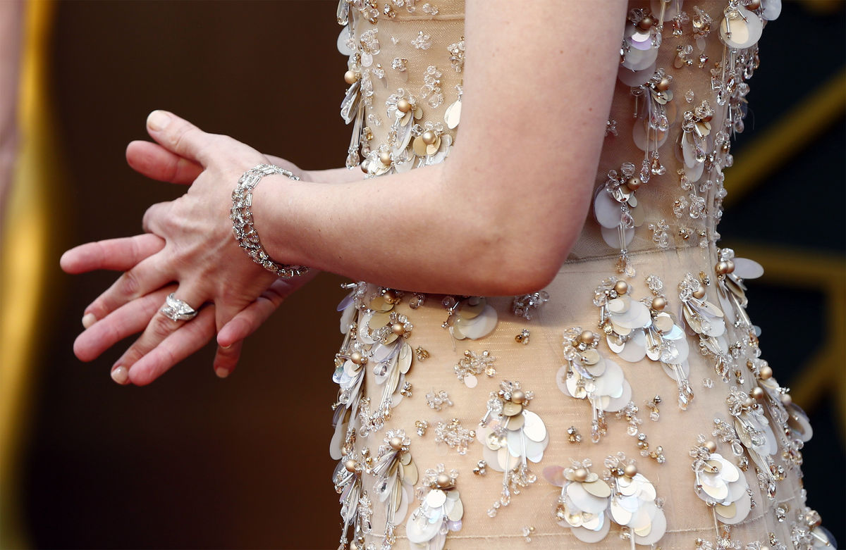 Detail of Cate Blanchett’s dress and jewellery are seen as she arrives at the 86th Academy Awards in Hollywood