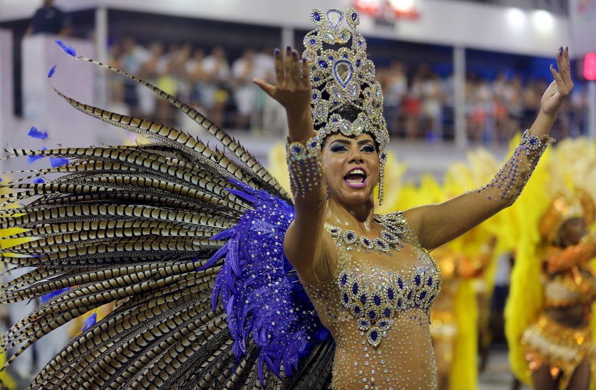 A reveller parades for Vila Maria samba school during a carnival in Sao Paulo, Brazil