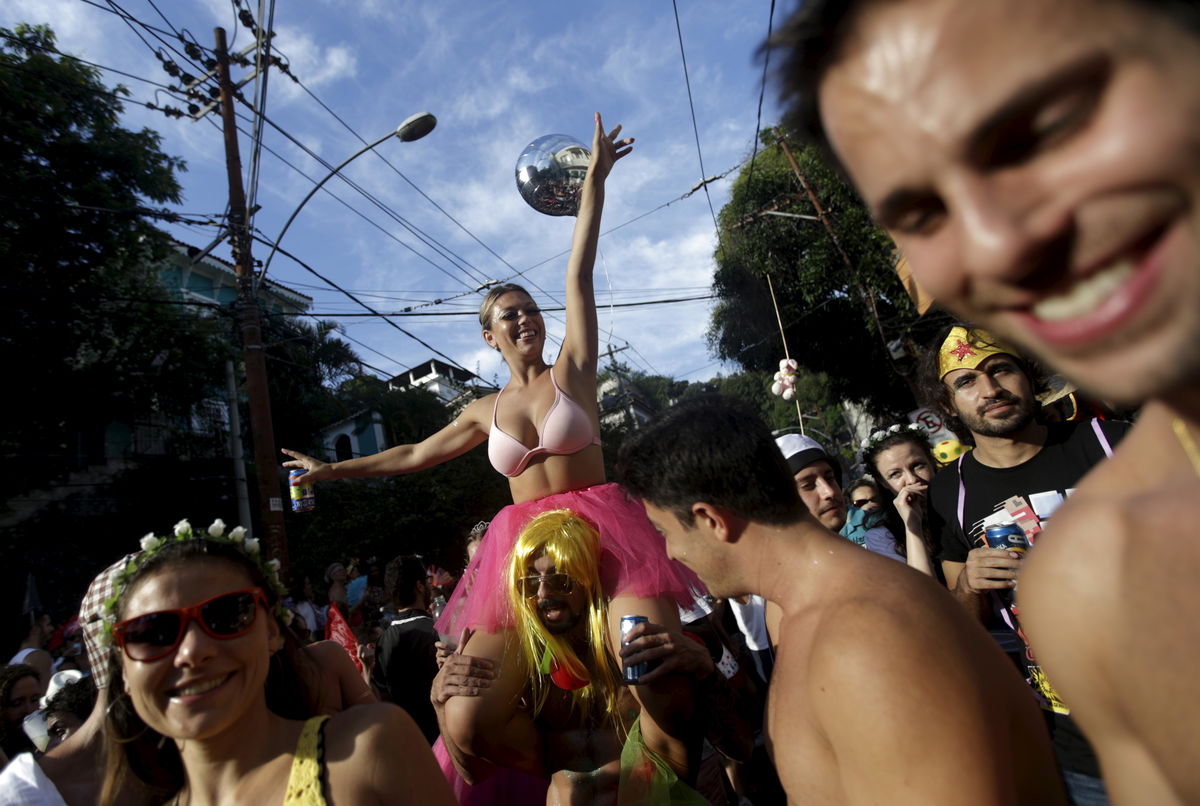Revellers take part in an annual block party known as “Ceu na Terra” (Heaven on Earth), one of the many carnival parties to take place in the neighbourhoods of Rio de Janeiro