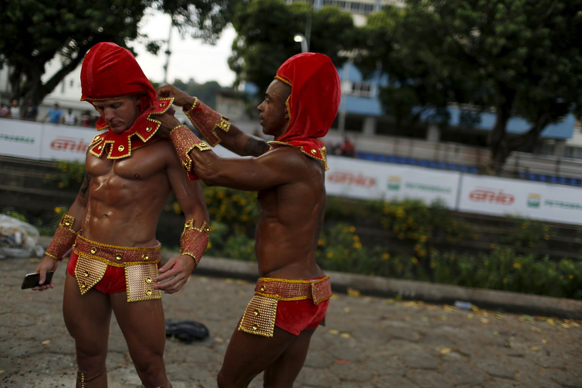 Revellers get ready before the first night of the Carnival parade of samba schools in Rio de Janeiro’s Sambadrome