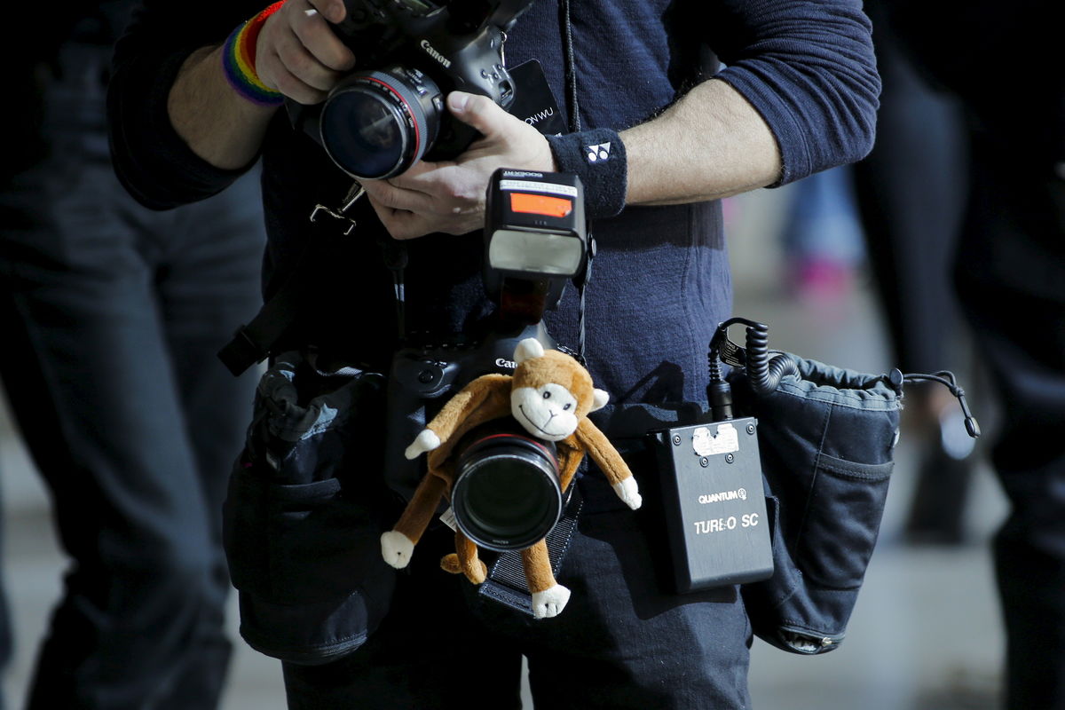 A fashion photographer attends the Jason Wu Fall/Winter 2016 collection during New York Fashion Week in New York