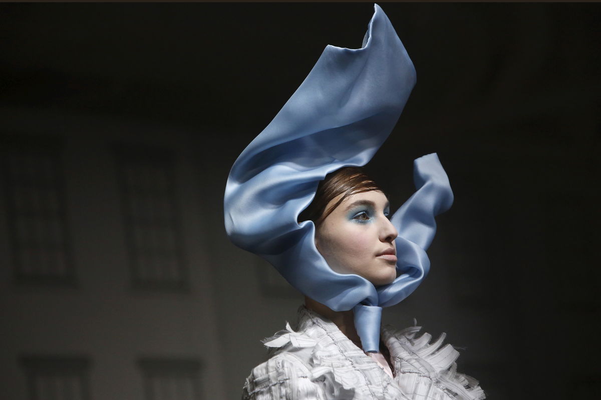 A model presents a creation from the Thom Browne Fall/Winter 2016 collection during New York Fashion Week.
