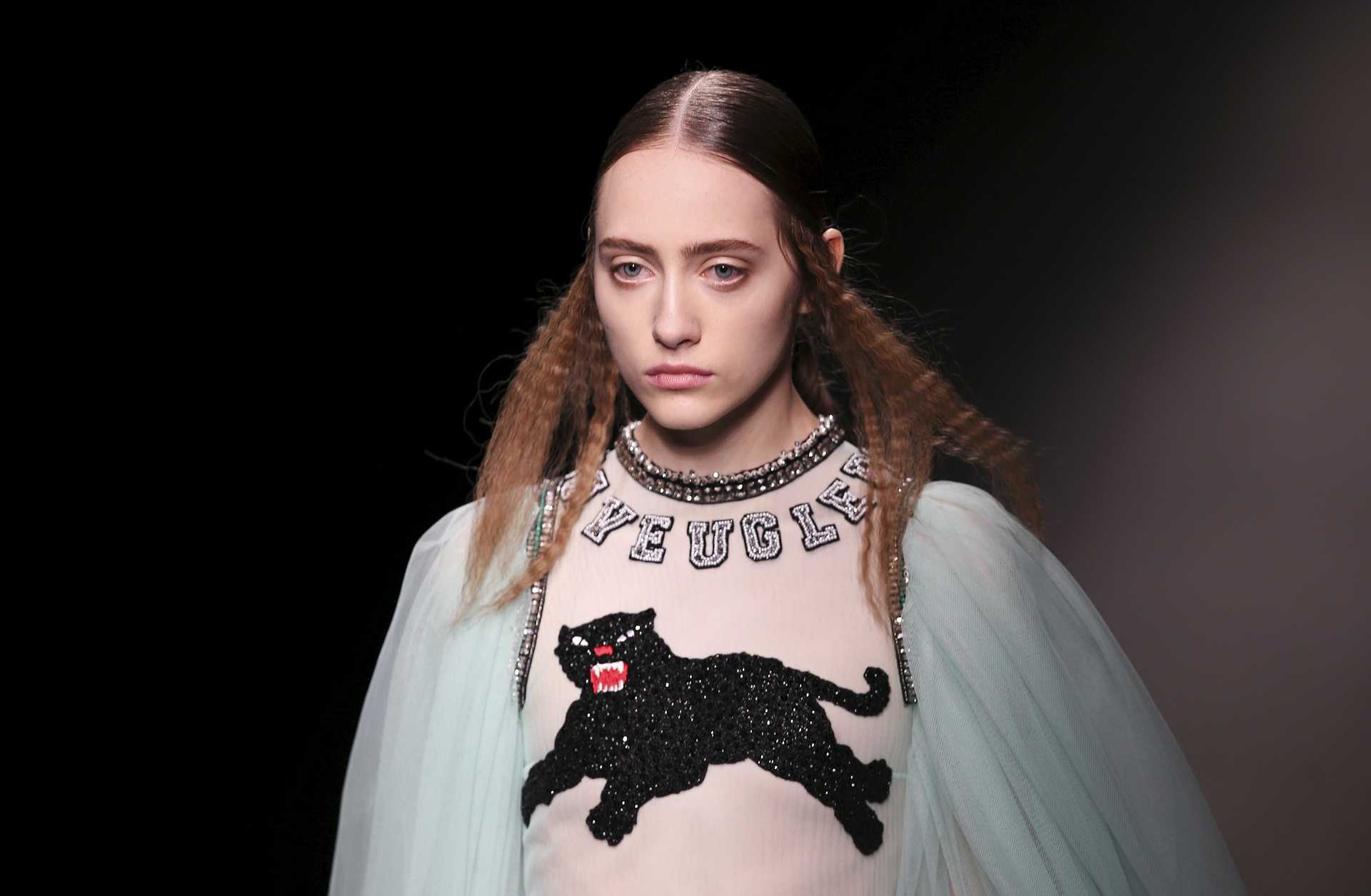 A model presents a creation from the Gucci Autumn/Winter 2016 woman collection during Milan Fashion Week