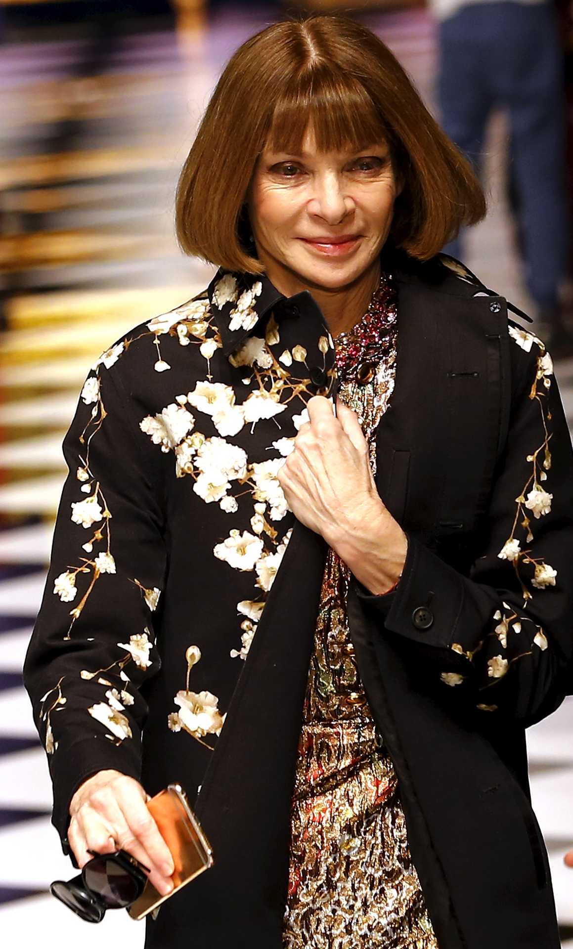 Editor of Vogue U.S. Anna Wintour leaves the catwalk after the Dolce & Gabbana Autumn/Winter 2016 woman collection during Milan Fashion Week