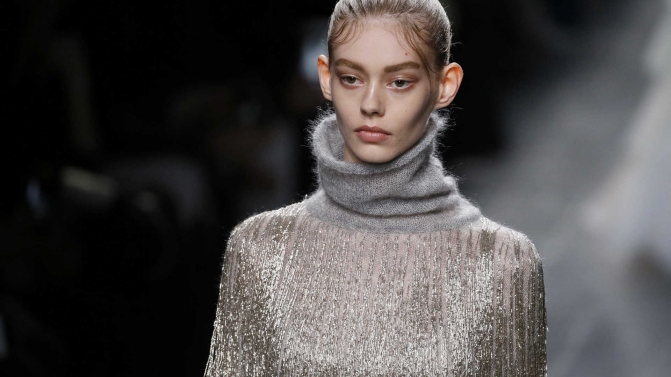 A model presents a creation by Italian designers Maria Grazia Chiuri and Pier Paolo Piccioli as part of their Fall/Winter 2016/2017 women’s ready-to-wear collection for fashion house Valentino in Paris