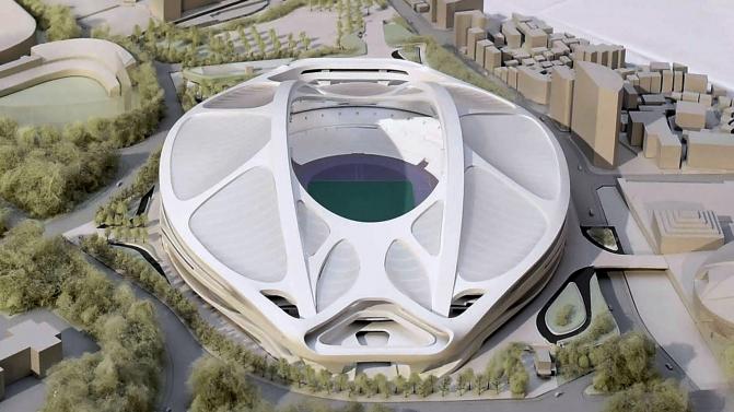 A rendering model of the new National Stadium for 2020 Tokyo Olympics and Paralympics, designed by Iraqi-British architect Zaha Hadid, is displayed at a meeting in Tokyo