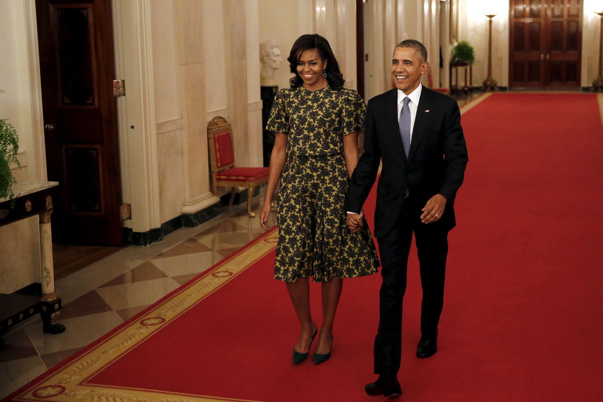 U.S. President Barack Obama and First Lady Michelle Obama arrive to the Presidential Medal of Freedom ceremony in the East Room of the White House in Washington