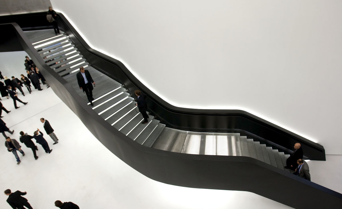 Guests walk inside Maxxi museum of contemporary art and architecture in Rome