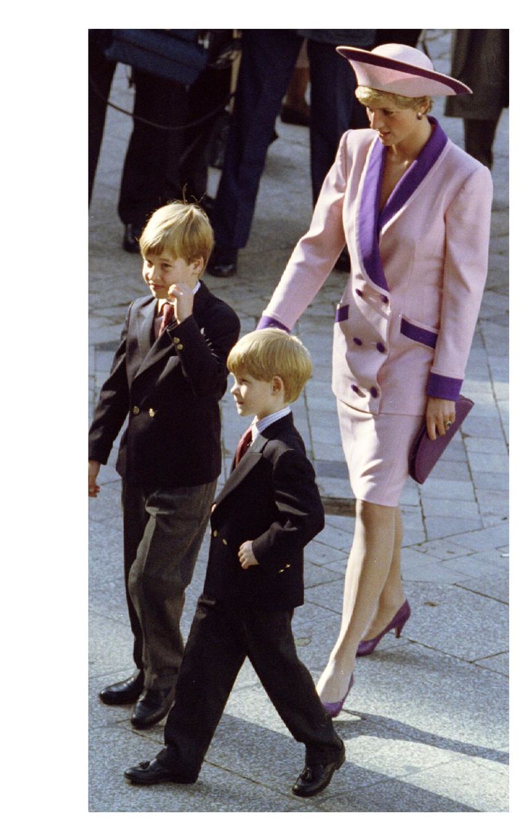 File photograph shows Diana, Princess of Wales arriving at a memorial service with her sons William and Harry during the 50th anniversary of the Blitz of London