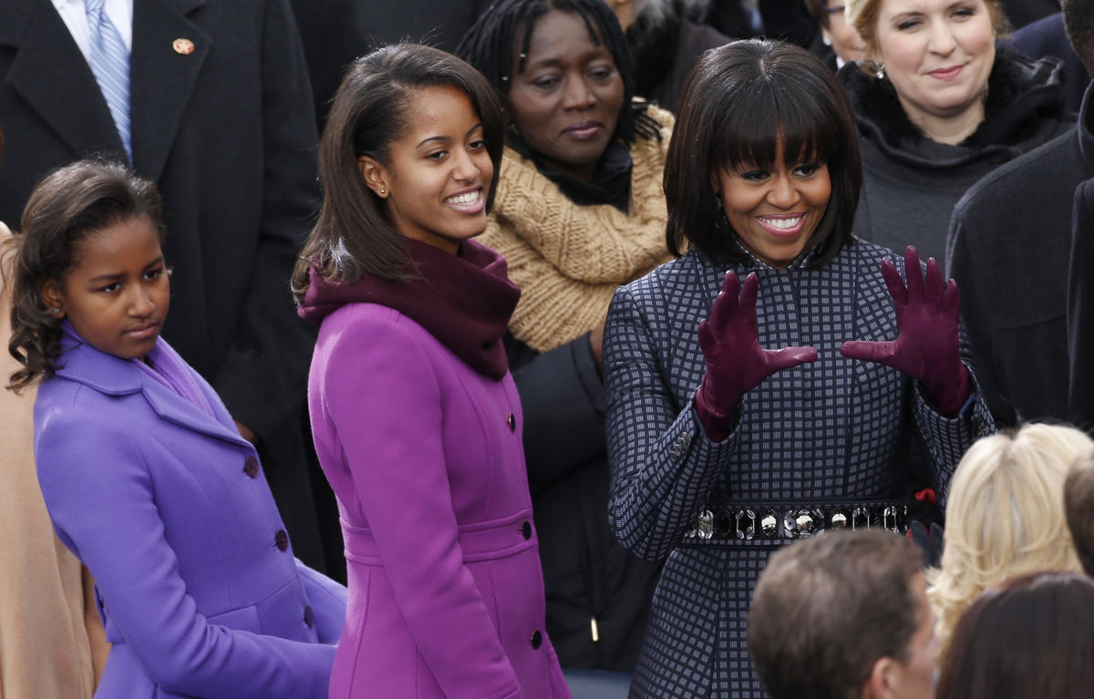 U.S. first lady Obama and her daughters arrive for inauguration ceremonies in Washington