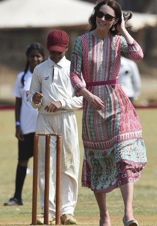 Catherine, Duchess of Cambridge, walks after playing a game of cricket with Indian children who are beneficiaries of NGOs at the Oval Maidan in Mumbai