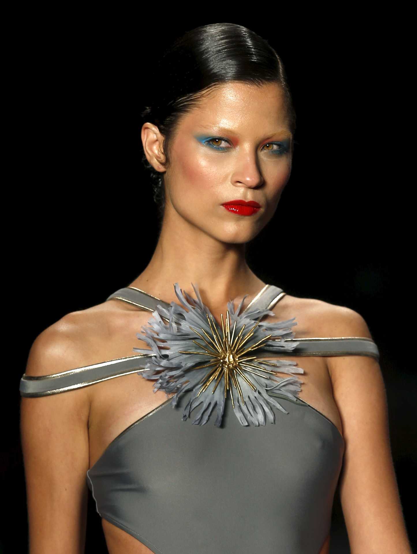 A model presents a creation from the Adriana Degreas collection during Sao Paulo Fashion Week