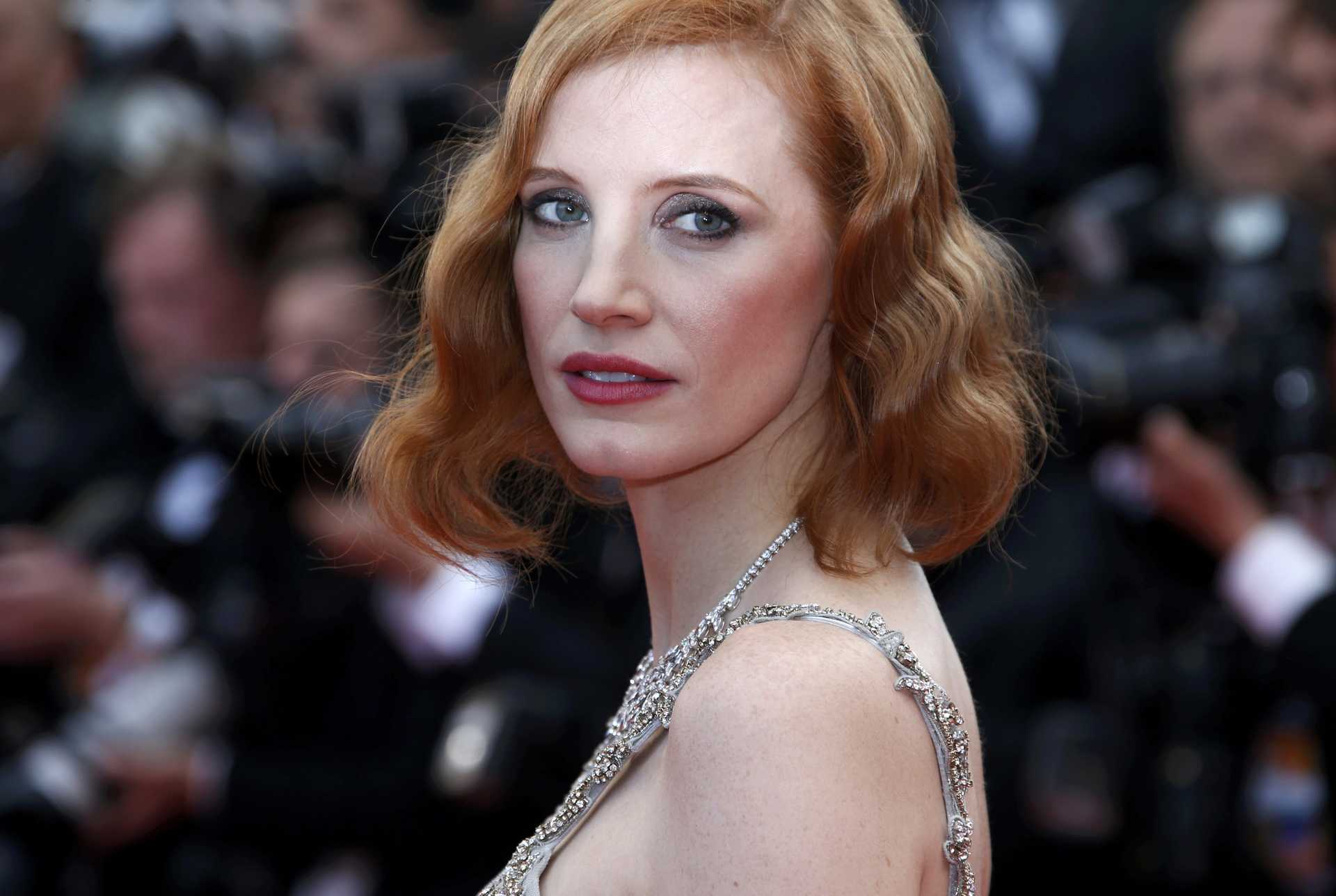 Actress Jessica Chastain poses on the red carpet as she arrives for the screening of the film “Money Monster” out of competition during the 69th Cannes Film Festival in Cannes
