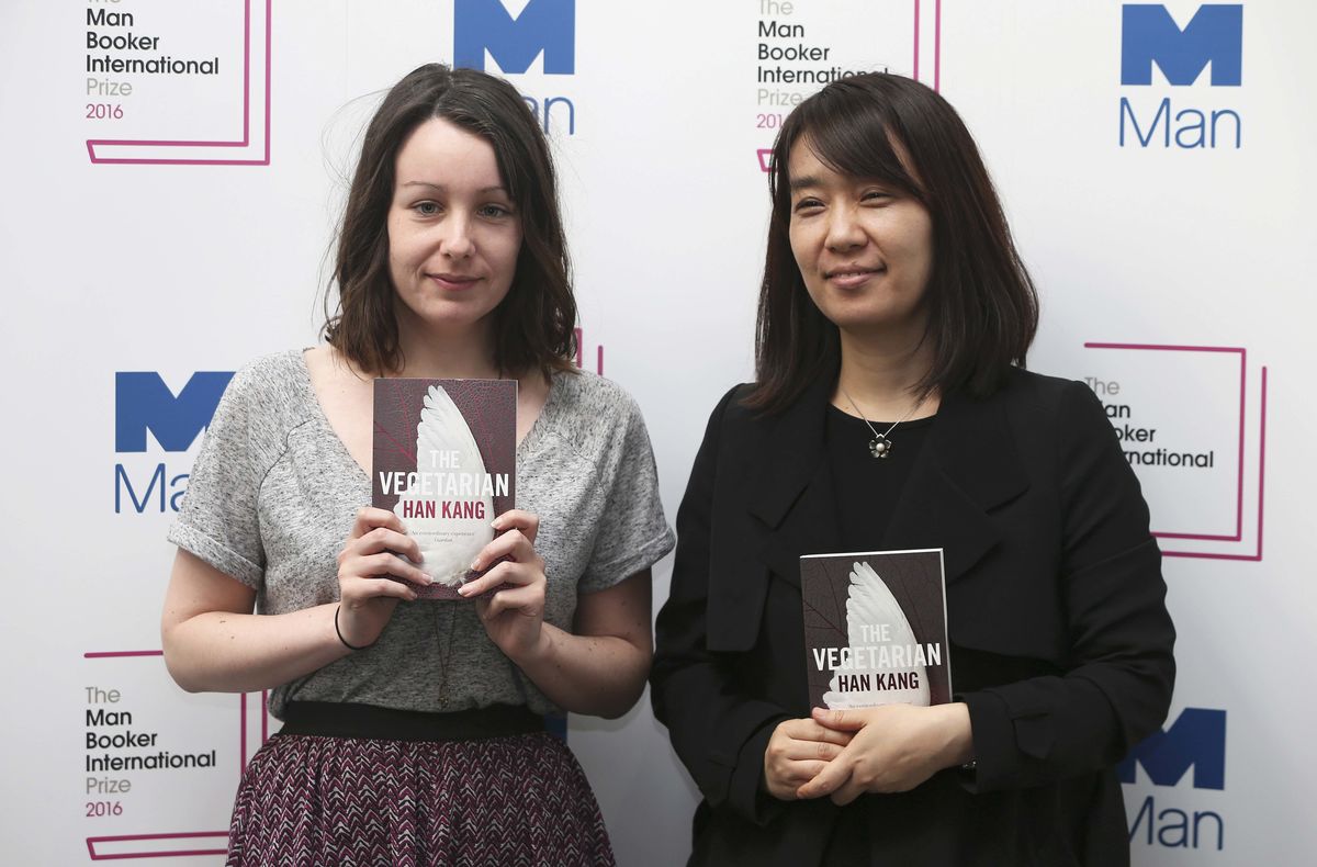 Nominated translator Deborah Smith and author Han Kang pose with their novel 