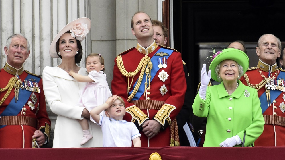 Members of the royal family stand on the balcony of Buckingham Palace in central London