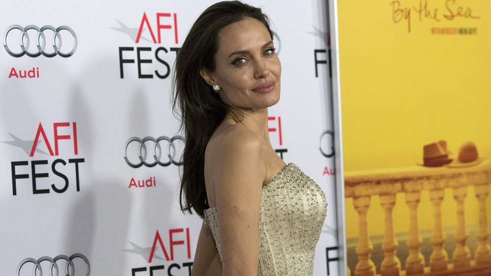 Director and cast member Jolie poses at the premiere of “By the Sea” during the opening night of AFI FEST 2015 in Hollywood