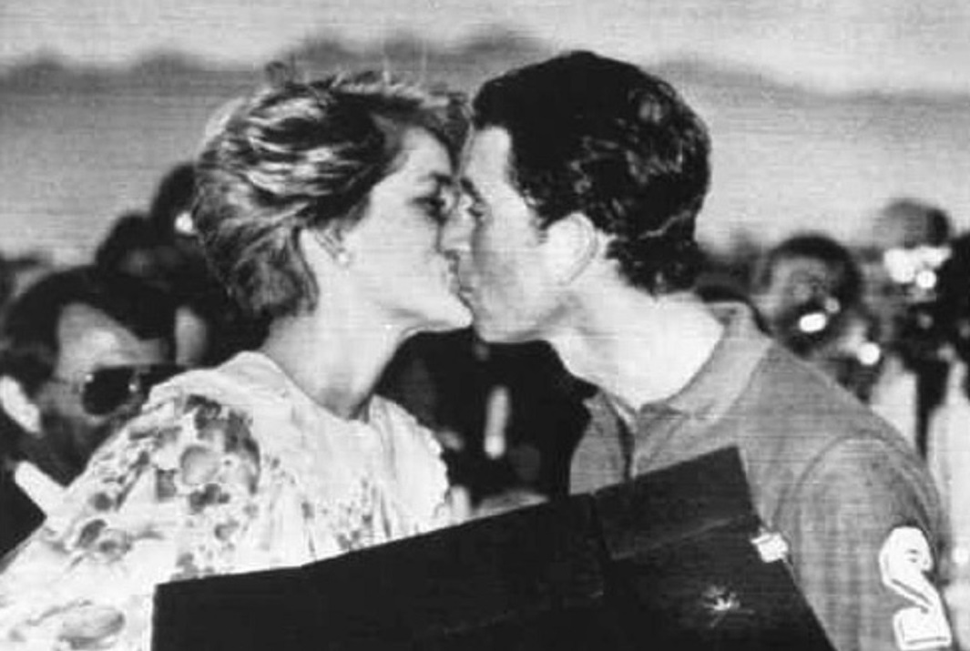 Princess Diana kisses Prince Charles after giving him his runners up prize at a Polo match he played in at the Royal Oman Polo Ground
