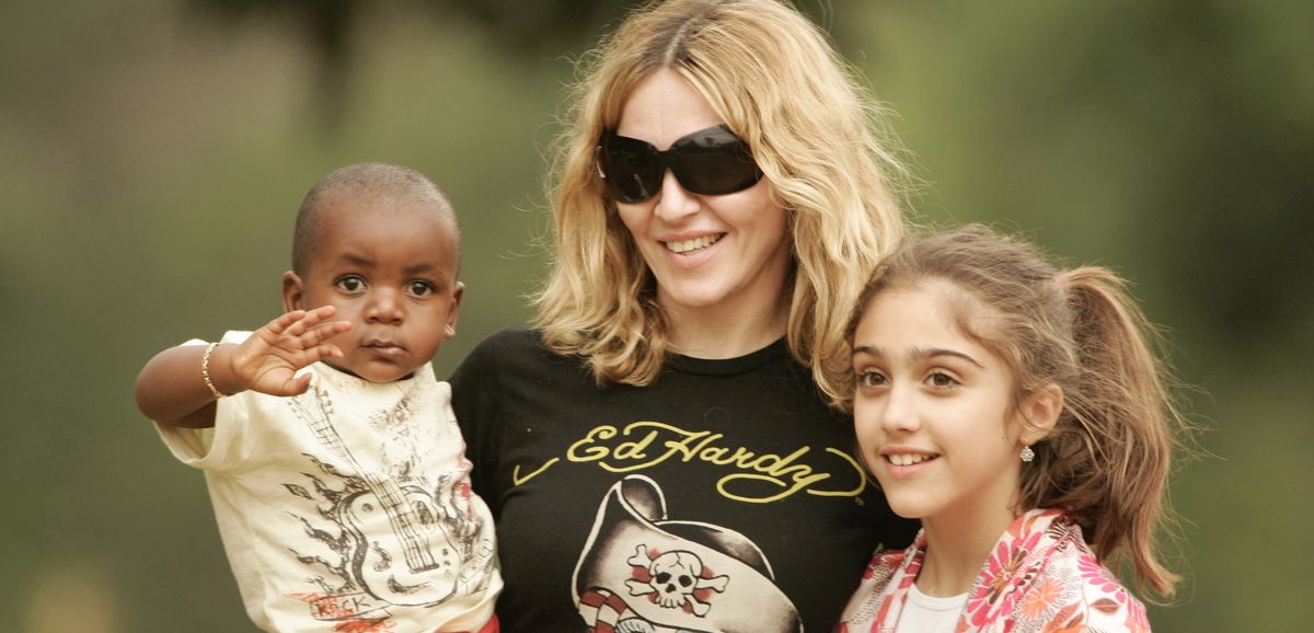 Madonna carries her adopted son David at the home of Hope orphanage in Mchinji village