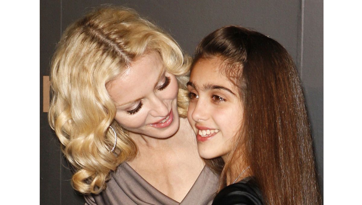 Entertainer Madonna arrives with her daughter to attend a reception to benefit UNICEF hosted by Gucci in New York