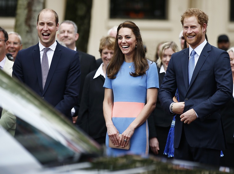 Prince William, Kate Duchess of Cambridge and Prince Harry (R) receive Britain’s Queen Elizabeth (not seen) as she arrives the Patron’s Lunch, an event to mark her 90th birthday, in London