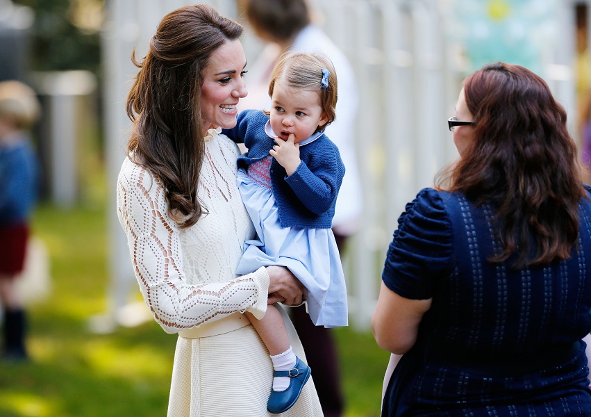 Britain’s Catherine, Duchess of Cambridge, and Princess Charlotte attend a children’s party at Government House in Victoria