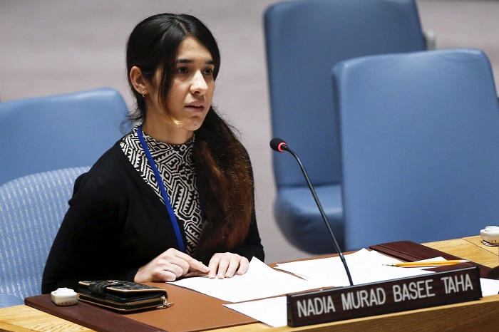 Nadia Murad Basee, a 21-year-old Iraqi woman of the Yazidi faith, speaks to members of the Security Council during a meeting at the United Nations headquarters in New York