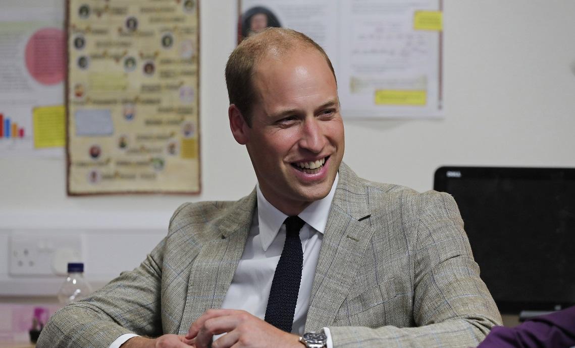 Britain’s Prince William talks to patients during his visit to Keech Hospice Care in Luton