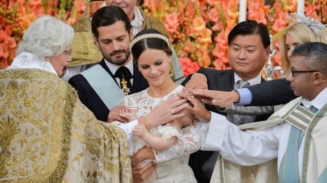 Sweden’s Princess Sofia holds her son Prince Alexander during his christening at the Palace Chapel of the Drottningholm Palace, near Stockholm, Sweden