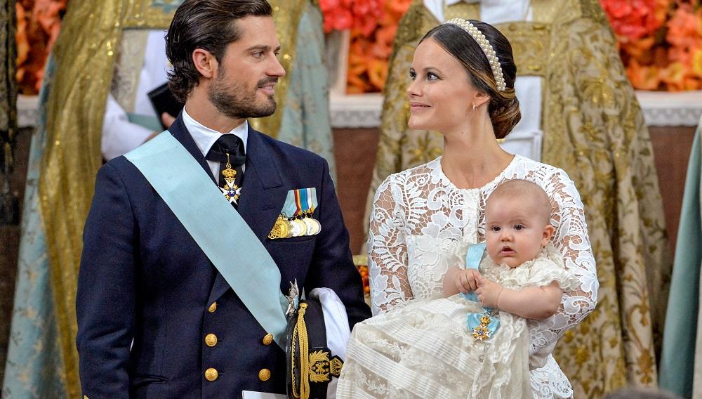 Prince Carl Philip and Princess Sofia with Prince Alexander during his christening at the Palace Chapel of the Drottningholm Palace, Stockholm