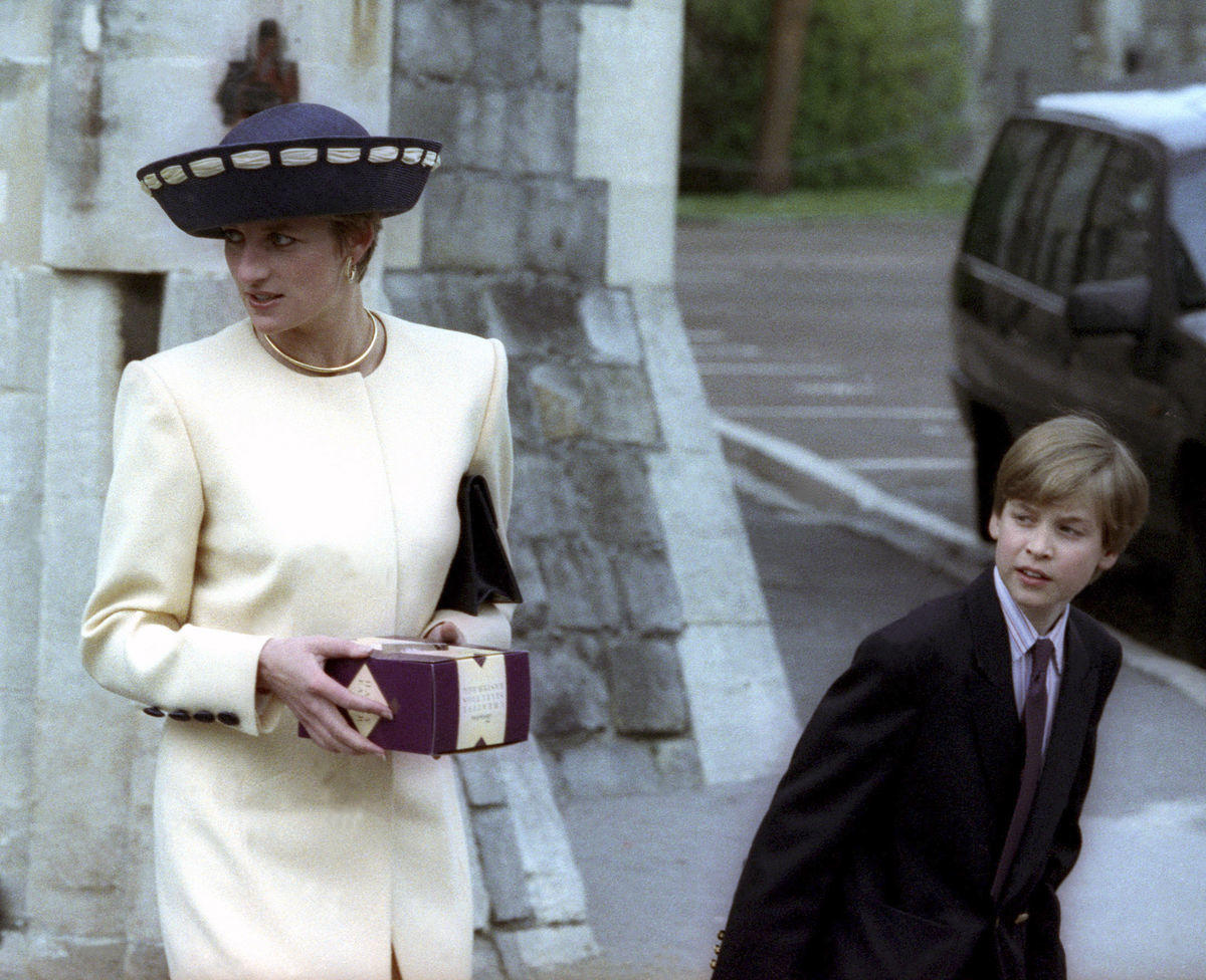 File photograph shows Diana, Princess of Wales and her eldest son Prince William waiting for Prince Harry after attending the annual Easter Sunday church service at St.Georges Chapel inside Windsor Castle