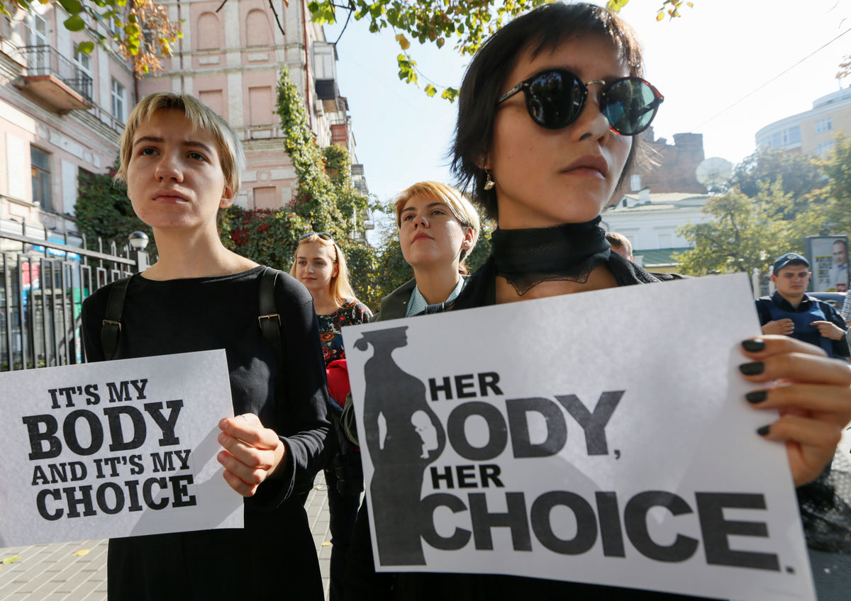 Activists take part in a rally to support Polish women protesting against a ban of abortion, in front of the Polish embassy in Kiev