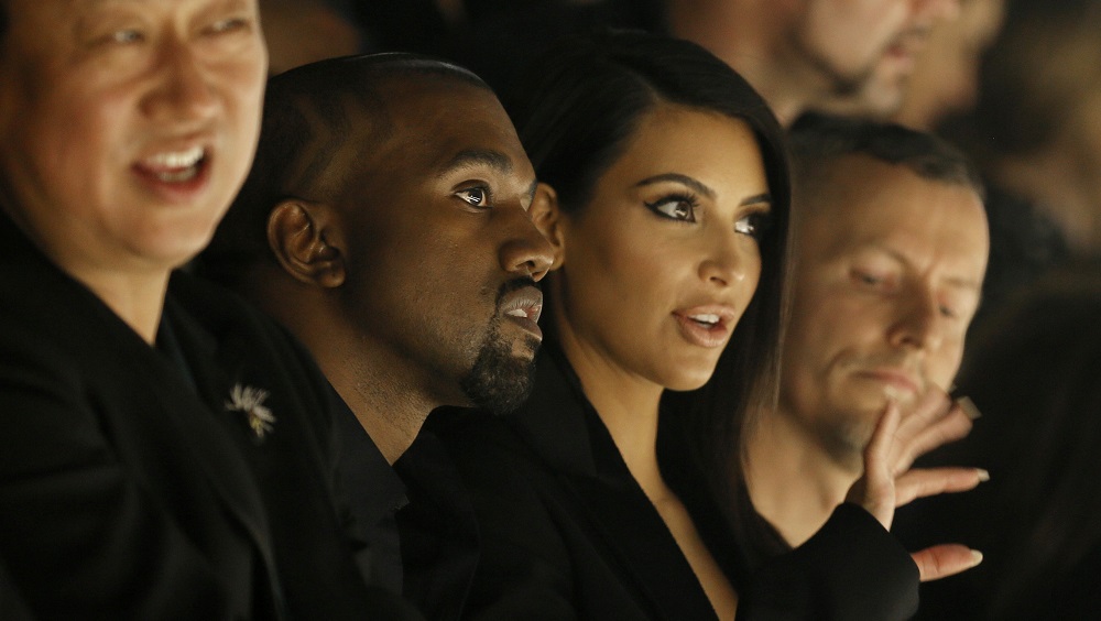 TV personality Kim Kardashian and rapper Kanye West attend the Israeli-American designer Alber Elbaz Spring/Summer 2015 women’s ready-to-wear collection for fashion house  Lanvin during Paris Fashion Week