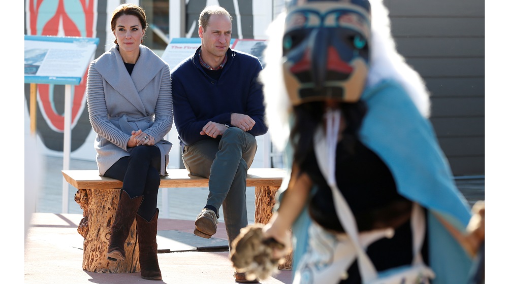 Britain’s Prince William and Catherine, Duchess of Cambridge, watch aboriginal dancers perform during a ceremony in Carcross