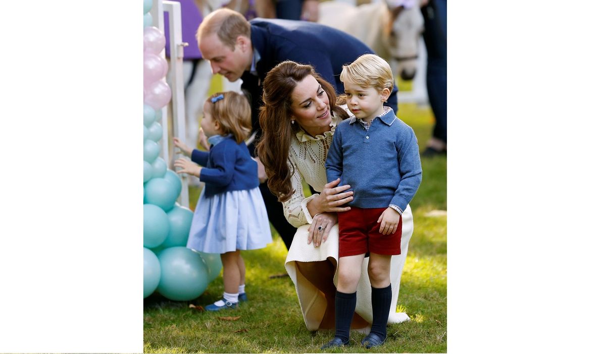 Britain’s Prince William, Catherine, Duchess of Cambridge, Prince George and Princess Charlotte attend a children’s party at Government House in Victoria