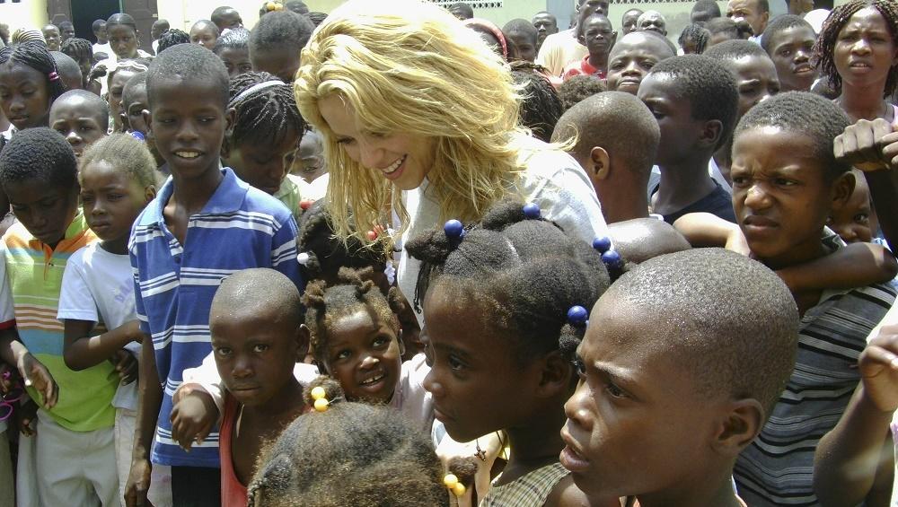 Colombian pop singer Shakira meets earthquake survivors during her visit to Port-au-Prince