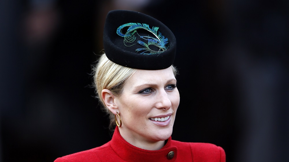 Britain's Zara Phillips smiles in the unsaddling enclosure on Ladies Day at the Cheltenham Festival horse racing meet in Gloucestershire