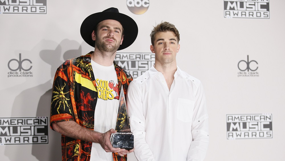 The Chainsmokers pose with their award during the 2016 American Music Awards in Los Angeles