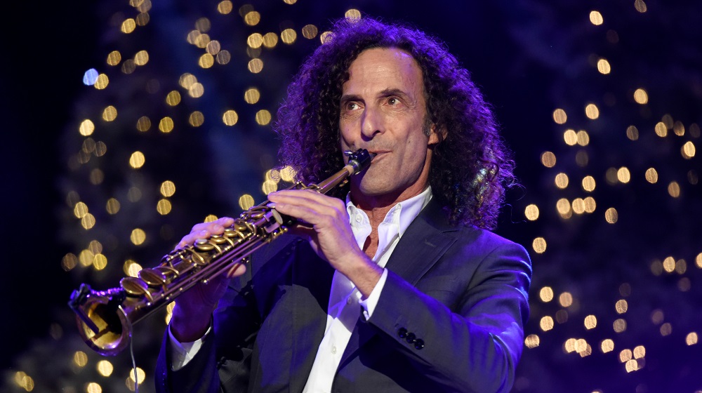 Kenny G performs before the 85th annual Hollywood Christmas Parade in Los Angeles